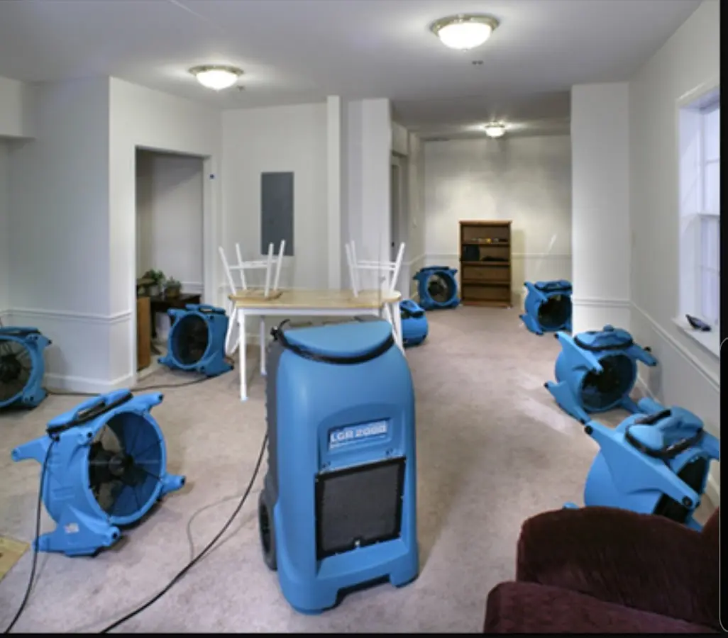 Air movers and dehumidifier setup for Water Damage Restoration in Jasper